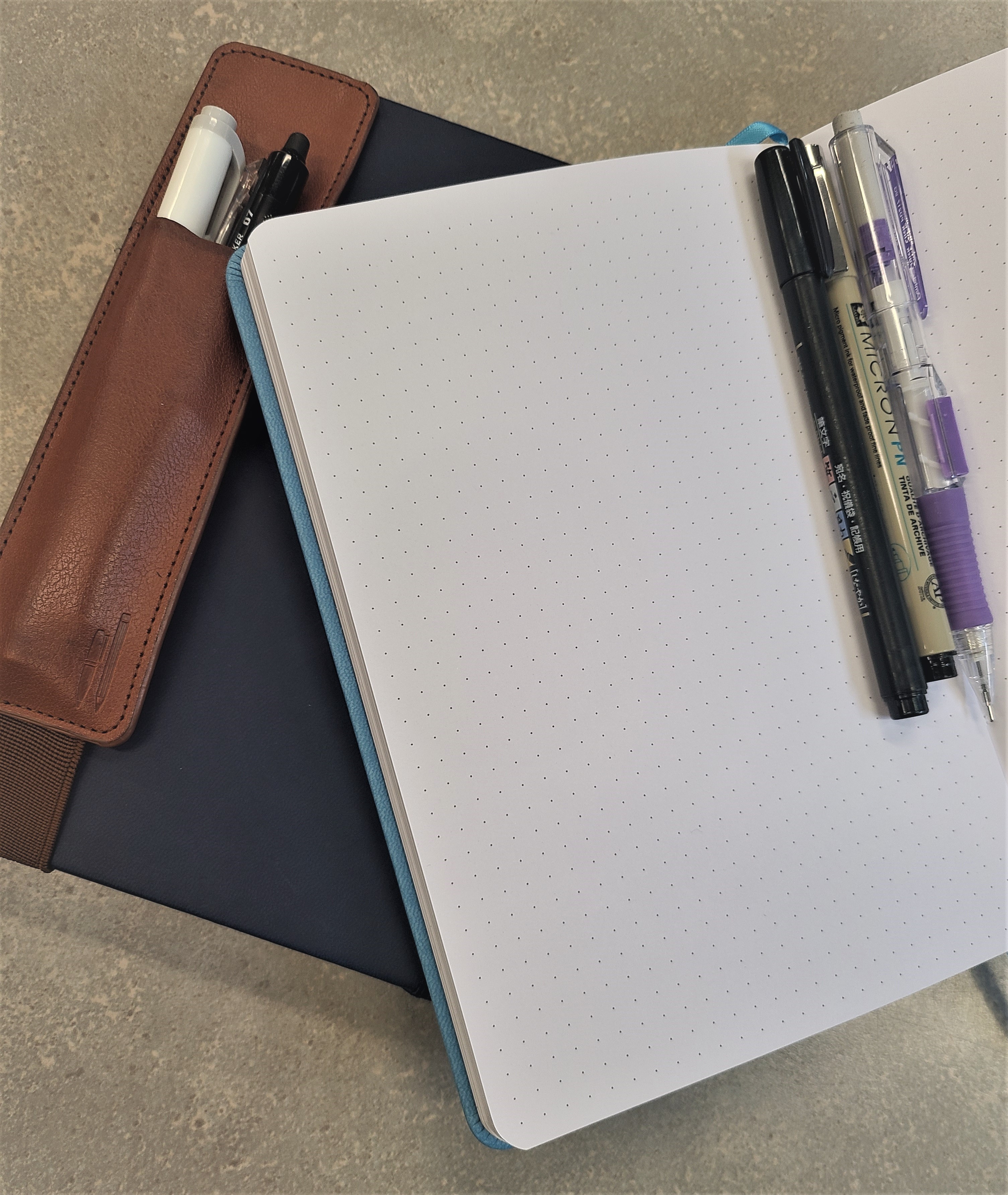 blank notebook and pen