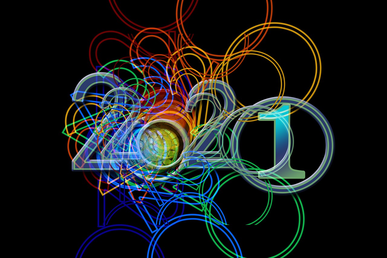 The year 2021 with a clock on a black background 