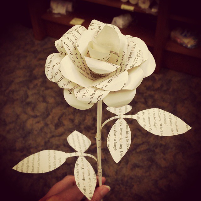 imge of a paper rose made out of book pages