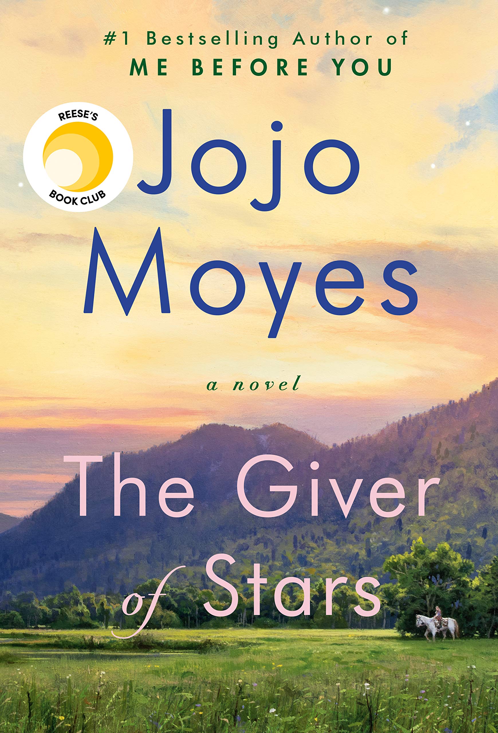 Cover of The Giver of Stars by Jojo Moyes. Green meadow with purple mountains and a yellow and orange sky. 