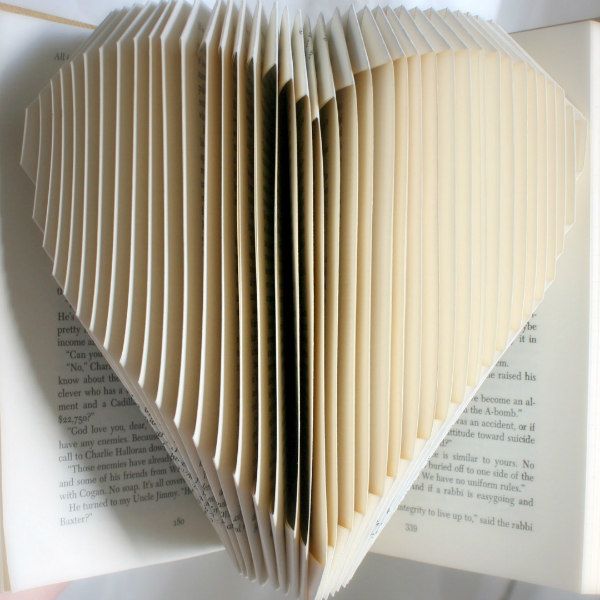 a heart folded into a book