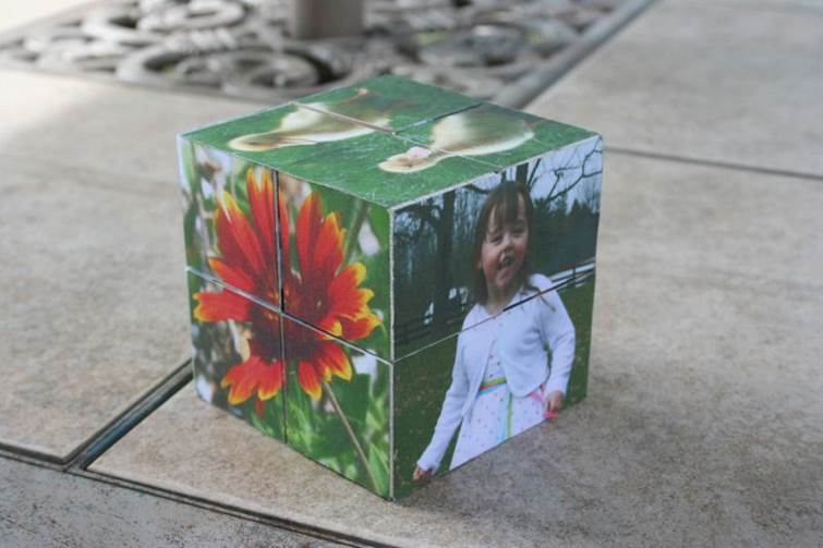 image of a cube with a photo on each side