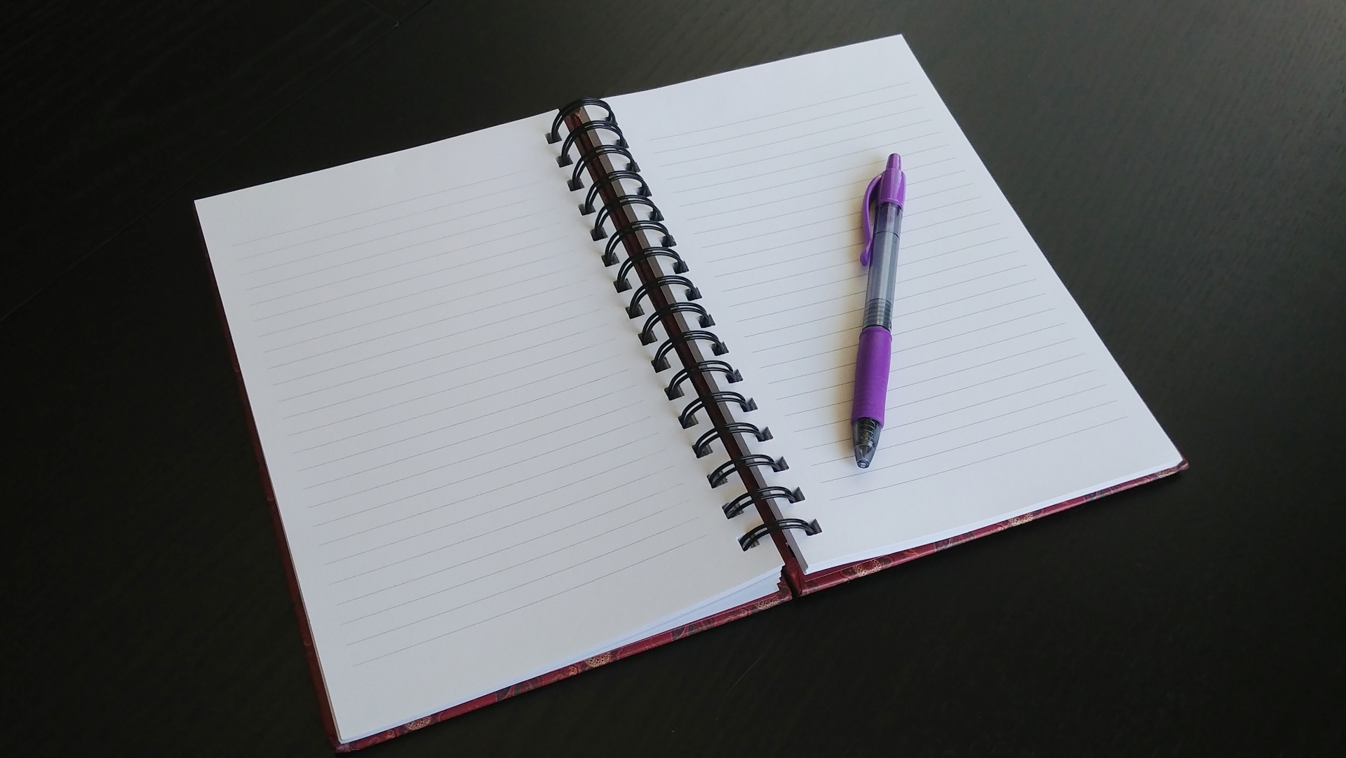 An open notebook and pen