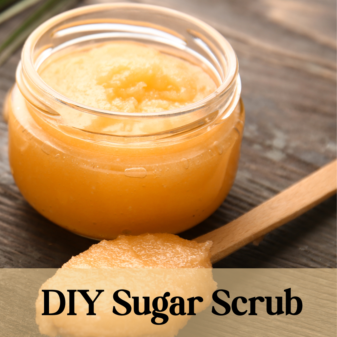 Jar of sugar scrub and spoon. Text at bottom reads "DIY Sugar Scrub"