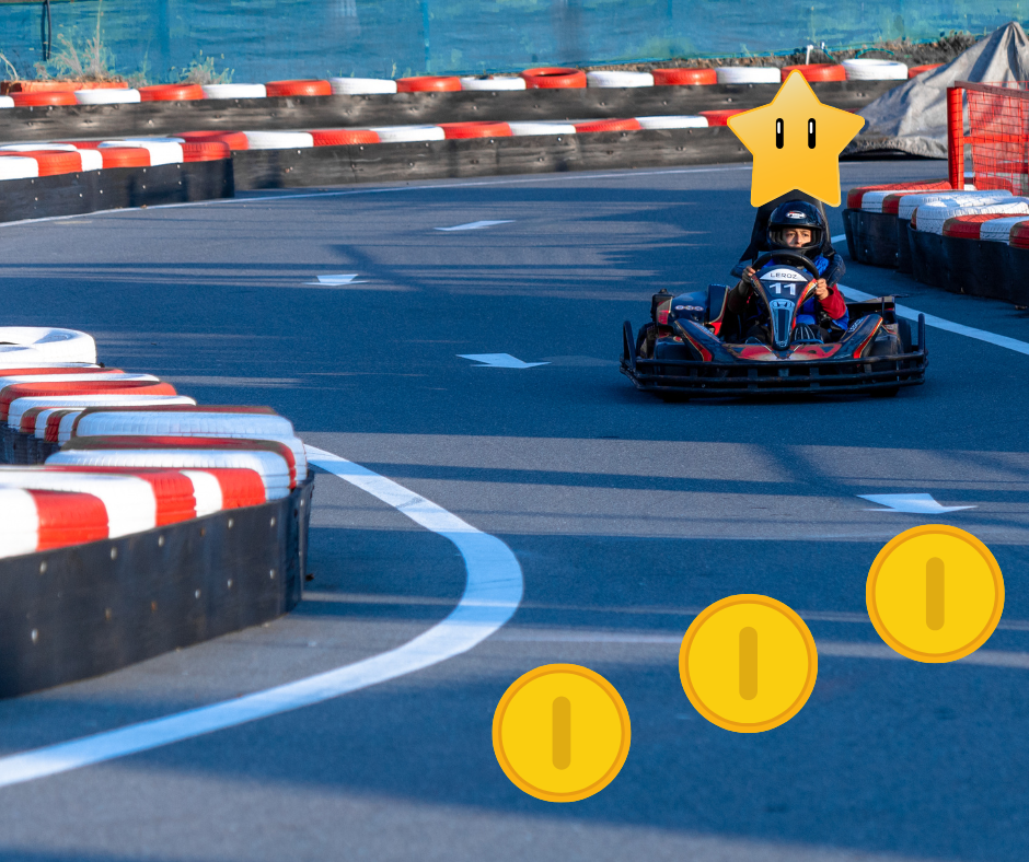A go-kart running a curving course, with Mario Kart coins in the foreground