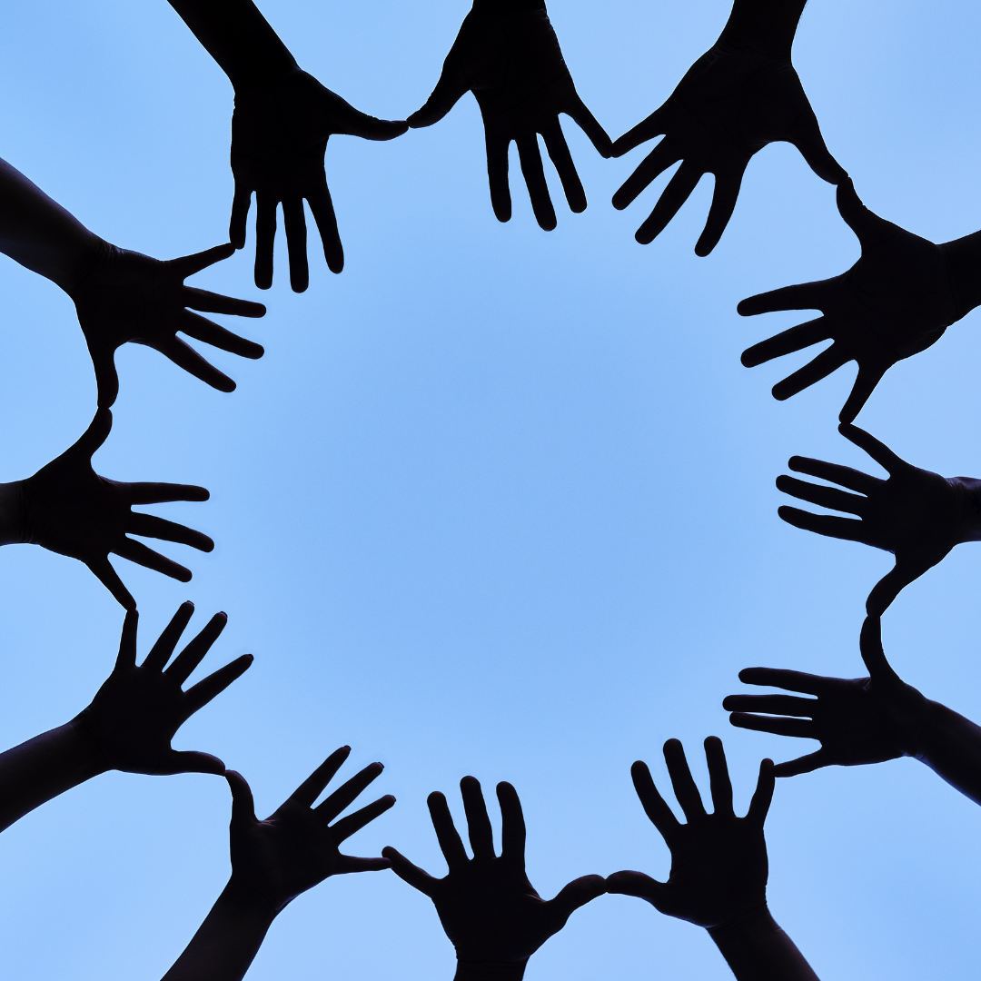 circle formed by outstretched hands to show collaboration