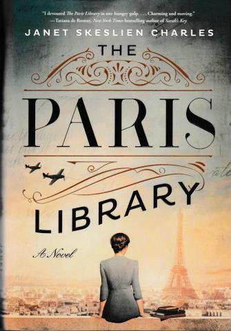 Book cover of The Paris Library. Title text above woman facing the Eiffel Tower