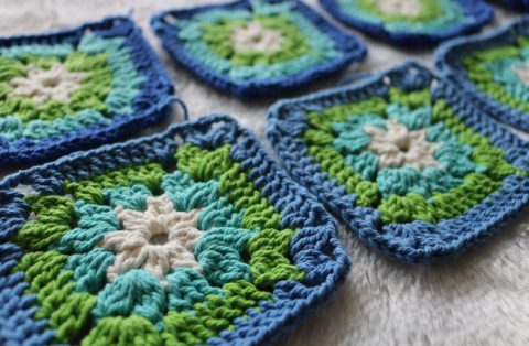 photo of a line of granny squares