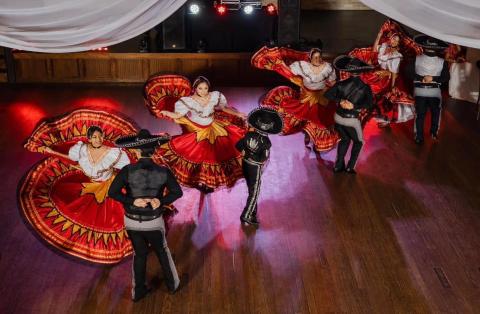 Dancers from Ballet Folklorico Herencia de Houston perform in pairs.