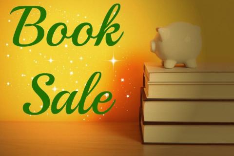 Graphic saying "Book Sale" next to stack of books with piggy bank on top.