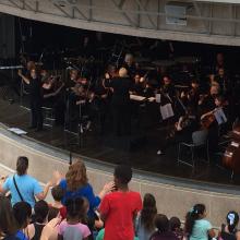 Fort Bend Symphony Orchestra performance at library's amphitheater.